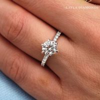 Elegant Symbolism in a Modern Round Engagement Ring Design
