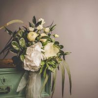 Should I take flowers to a funeral in the UK?