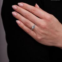 A timeless round ring with diamonds crafted for heartfelt moments