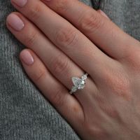 Exquisite 2ct Pear Trilogy Ring for Timeless Elegance